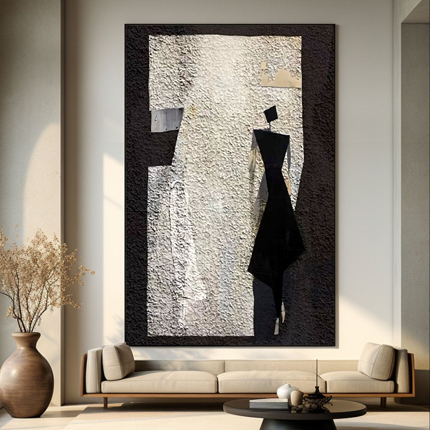 Abstract modern art piece in a modern living room setting with a vase and sofa.
